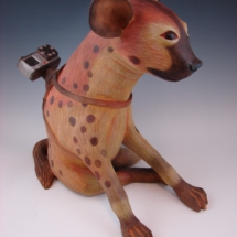 2. Hyena With GoPro., 2017, smokefired stoneware and colored pencils, 18h x 8.5w x 19d in.